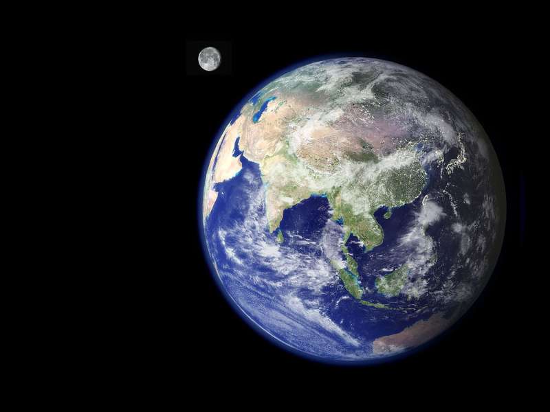 Earth showing Asia from space with the moon to the side. Photo credit: NASA