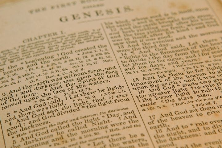 Close up of the first page of Genesis