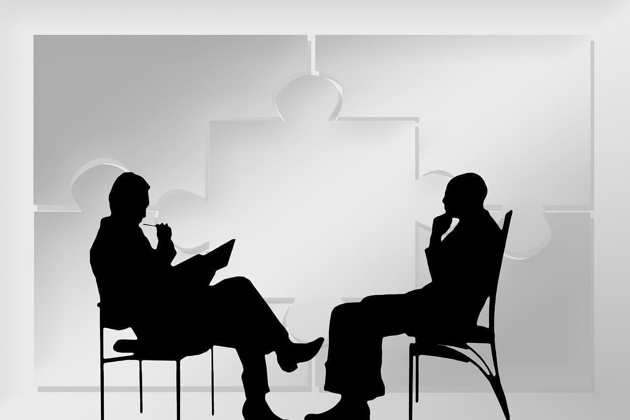 Silhouette two men discussing: photo credit: Pixabay