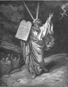 Etching of Moses holding the 10 commandments