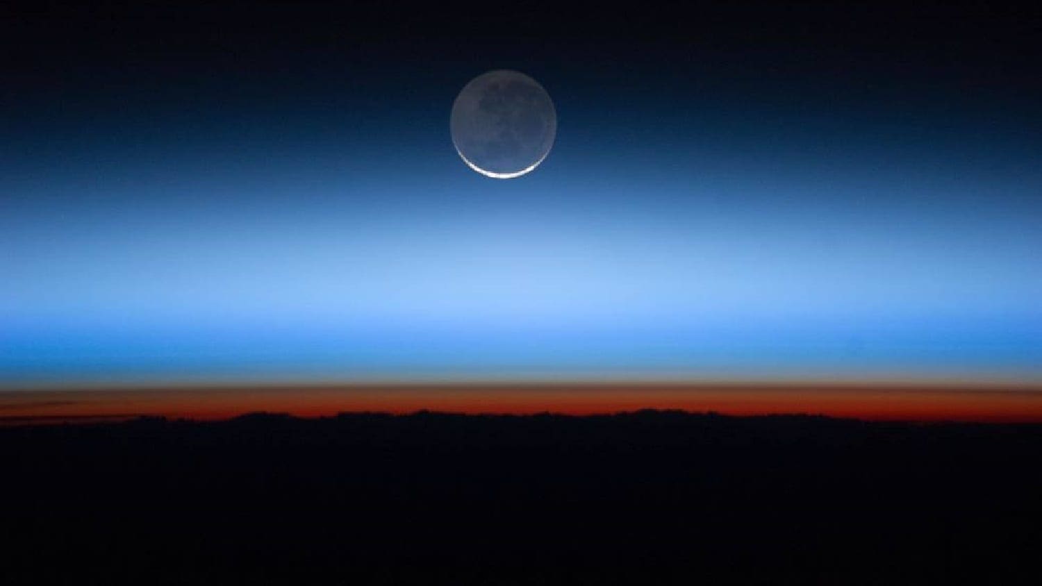 Earth's atmospheric layers at sunset from the ISS, photo credit: NASA