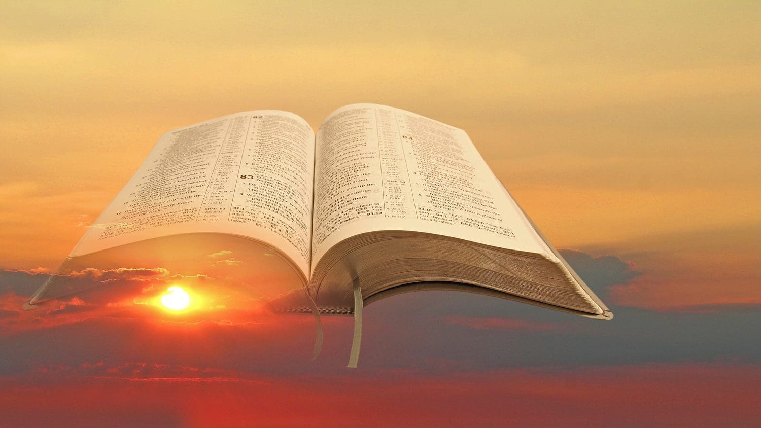 Sunset with an open Bible superimposed over it: Photo 165208206 / Clouds © Photodynamx | Dreamstime.com