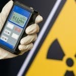 Handheld Geiger counter with radioactive warning sign: Photo 115596517 © Filin174 | Dreamstime.com